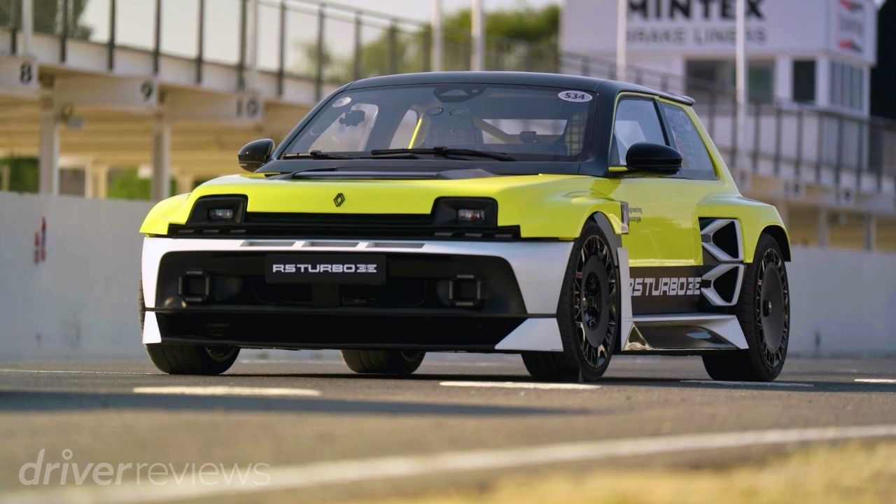 Renault 5 Turbo 3E front three-quarter static shot in yellow at Goodwood Motor Racing Circuit