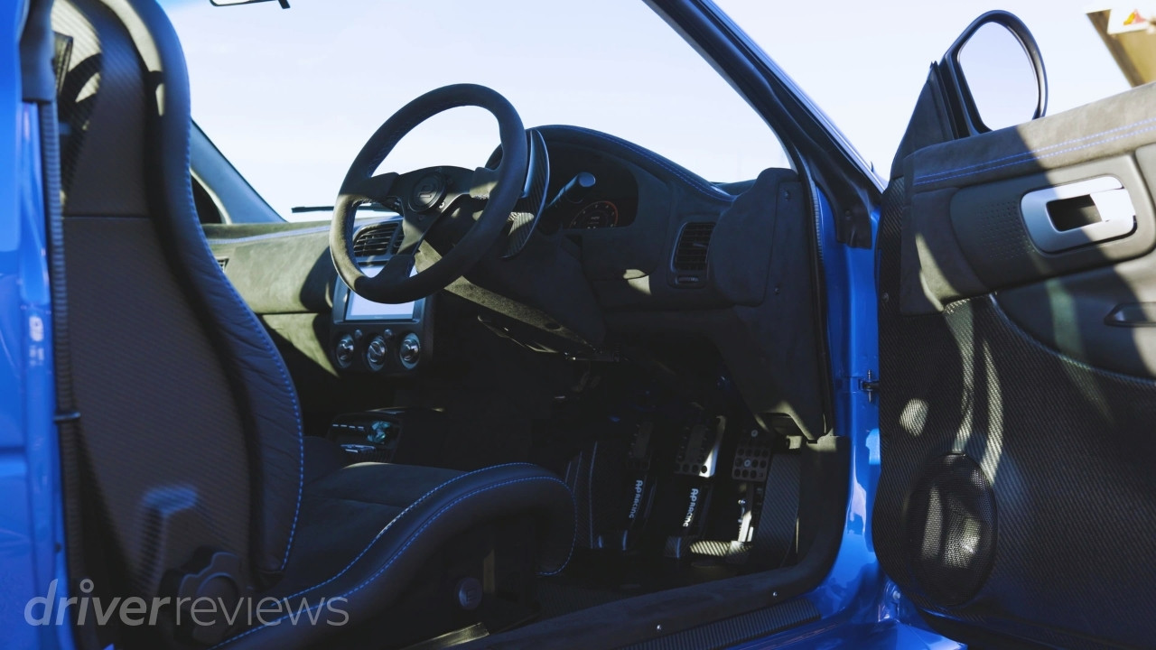 Prodrive P25 interior with Alcantara dashboard and steering wheel