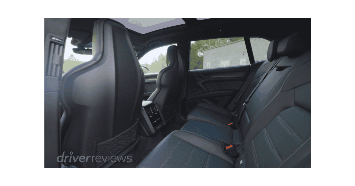 Porsche Cayenne Turbo Electric rear seats showing legroom and individual climate controls in DriverReviews test