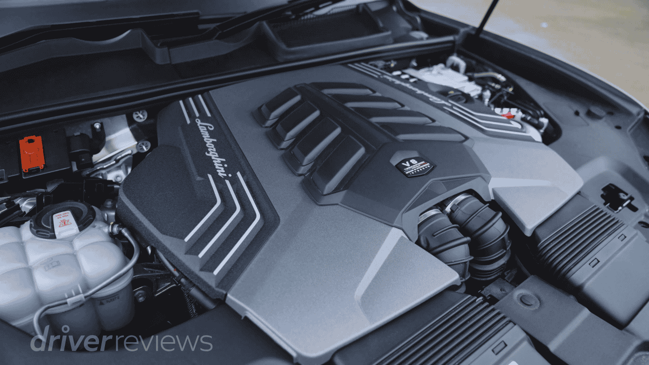 Lamborghini Urus SE twin-turbo V8 engine bay with Lamborghini engine cover during DriverReviews test
