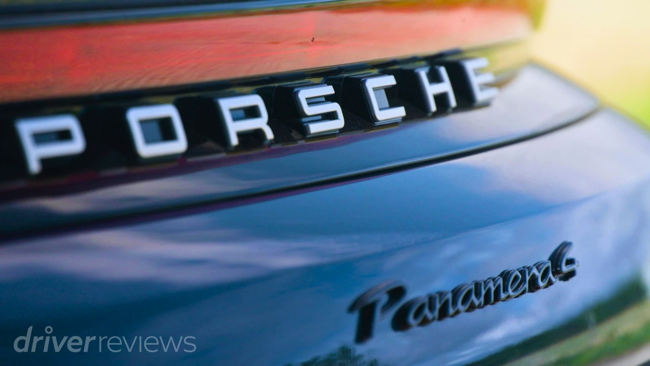 Montego Blue Metallic Porsche Panamera 4 E-Hybrid rear badging with Porsche lettering and Panamera 4 script