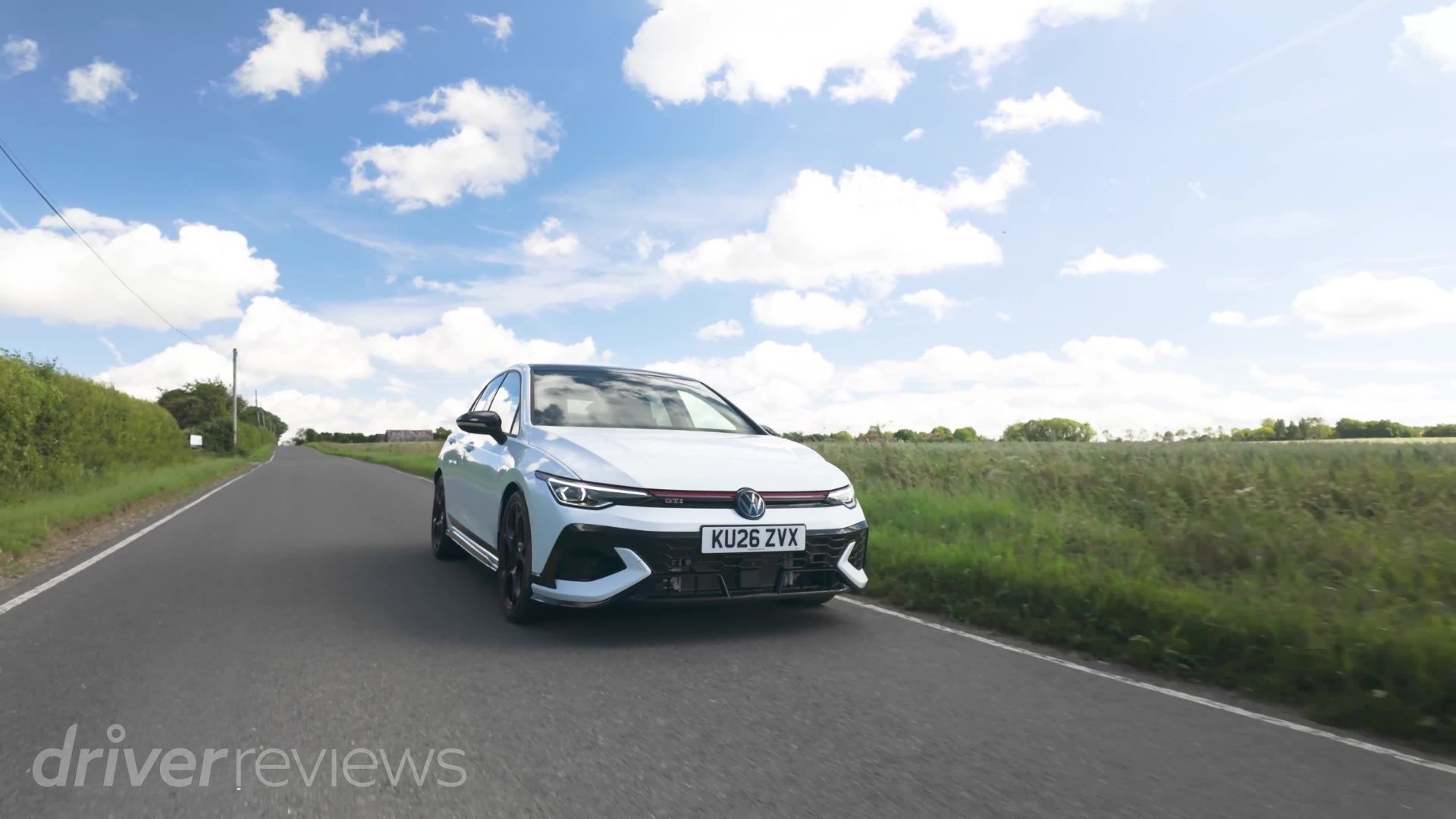 Volkswagen Golf GTI Edition 50 driving on a country road, front view