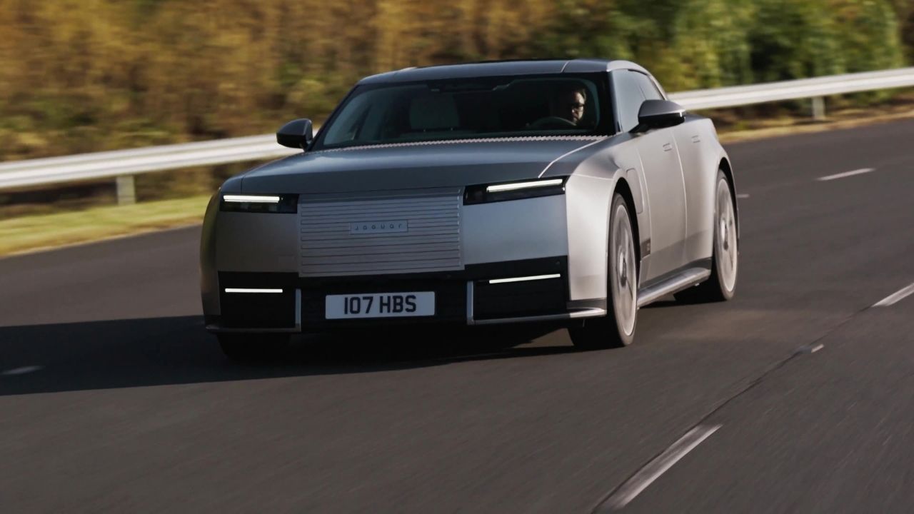 Jaguar Type 01 driving on the road