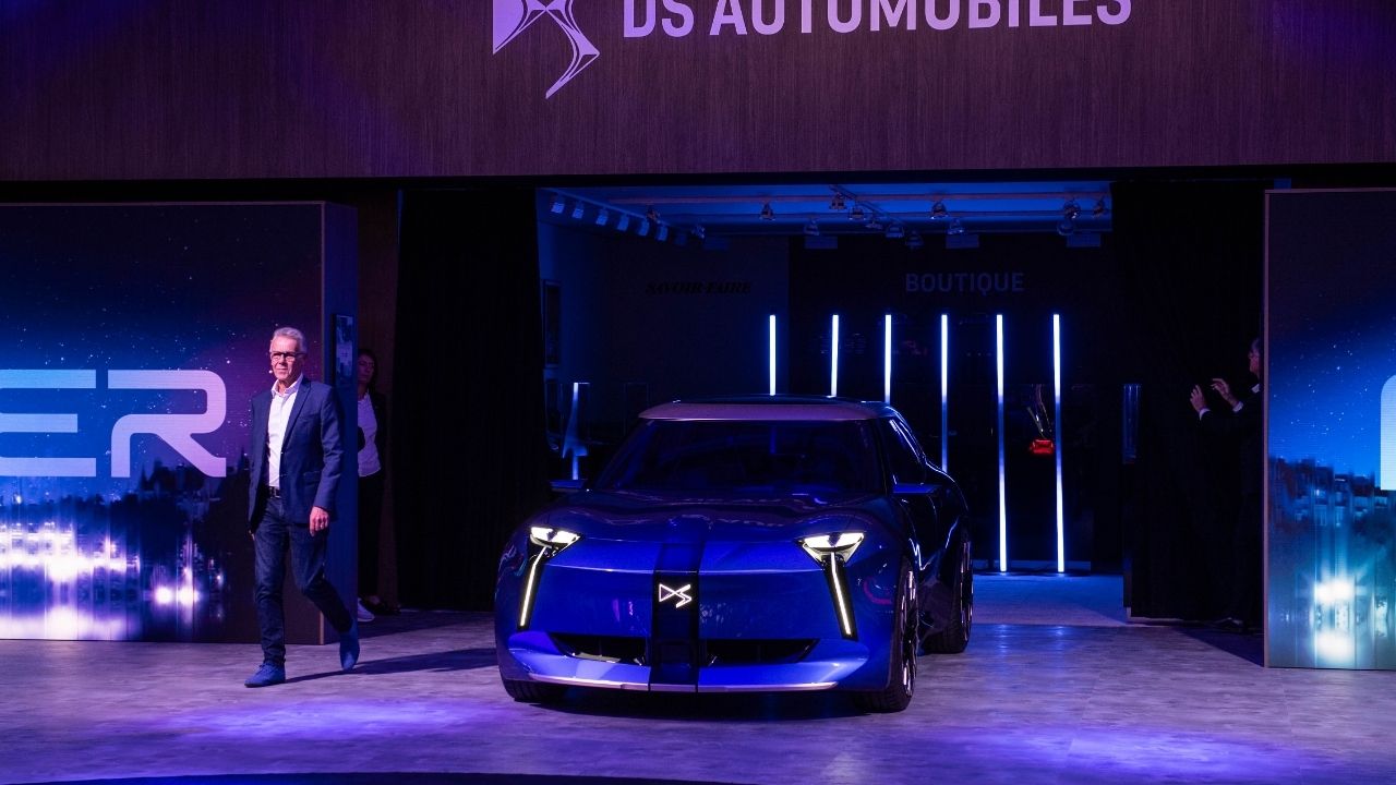 Cosmic Blue DS F3VER Concept with Y-shaped headlights and a vertical front panel on the DS Automobiles stand at Paris Motor Show 2026, shown head-on during its reveal