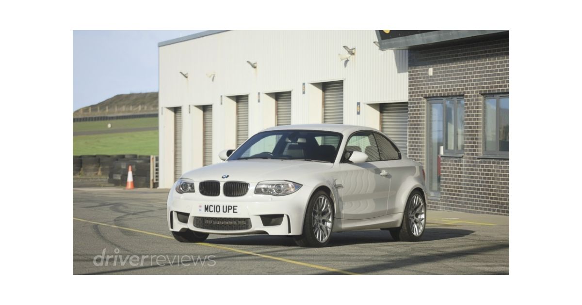BMW 1M in Alpine White front three-quarter view at Anglesey Circuit