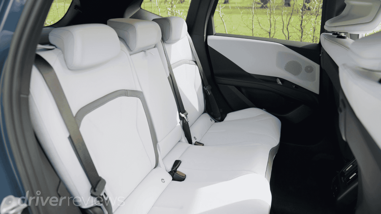 BMW iX3 rear seats in white leather with three-seat bench and generous legroom