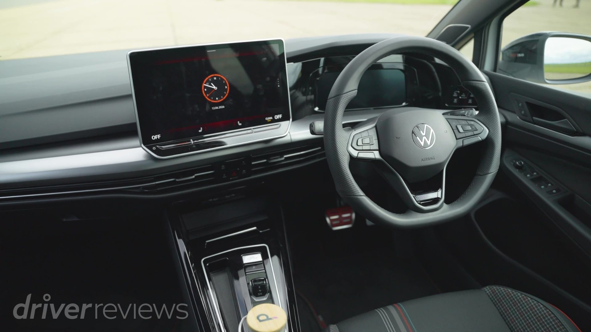 Volkswagen Golf GTI Edition 50 interior showing the digital instrument cluster and GTI-badged steering wheel