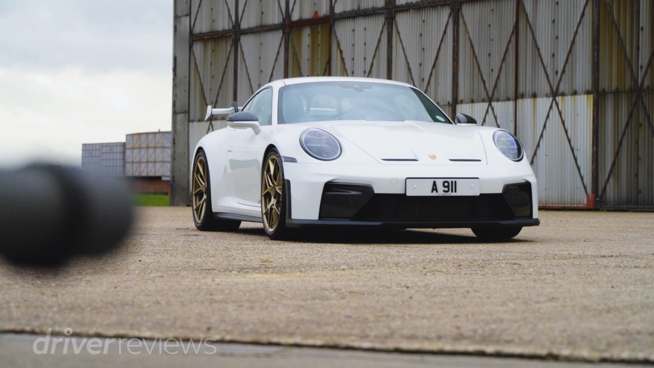 Porsche 911 GT3 992.2 front three-quarter view in white at DriverReviews track test