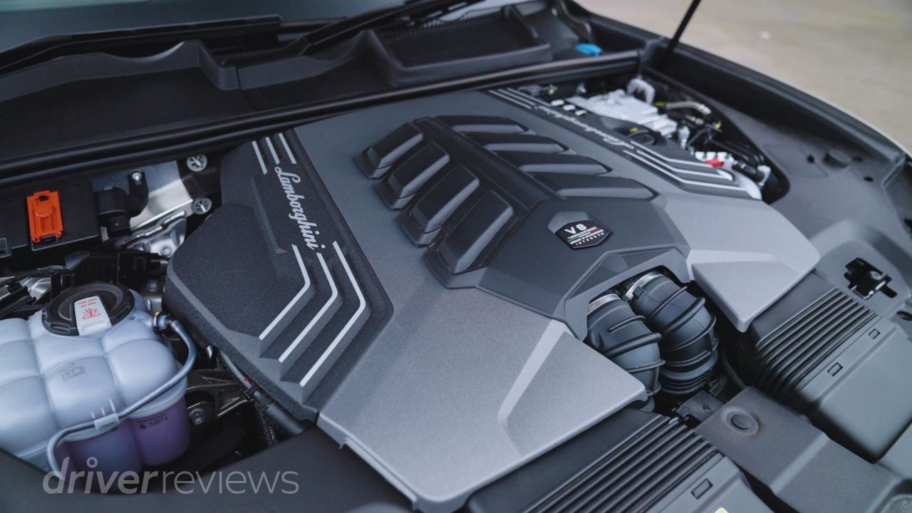 Lamborghini Urus SE twin-turbo V8 engine bay with Lamborghini engine cover during DriverReviews test