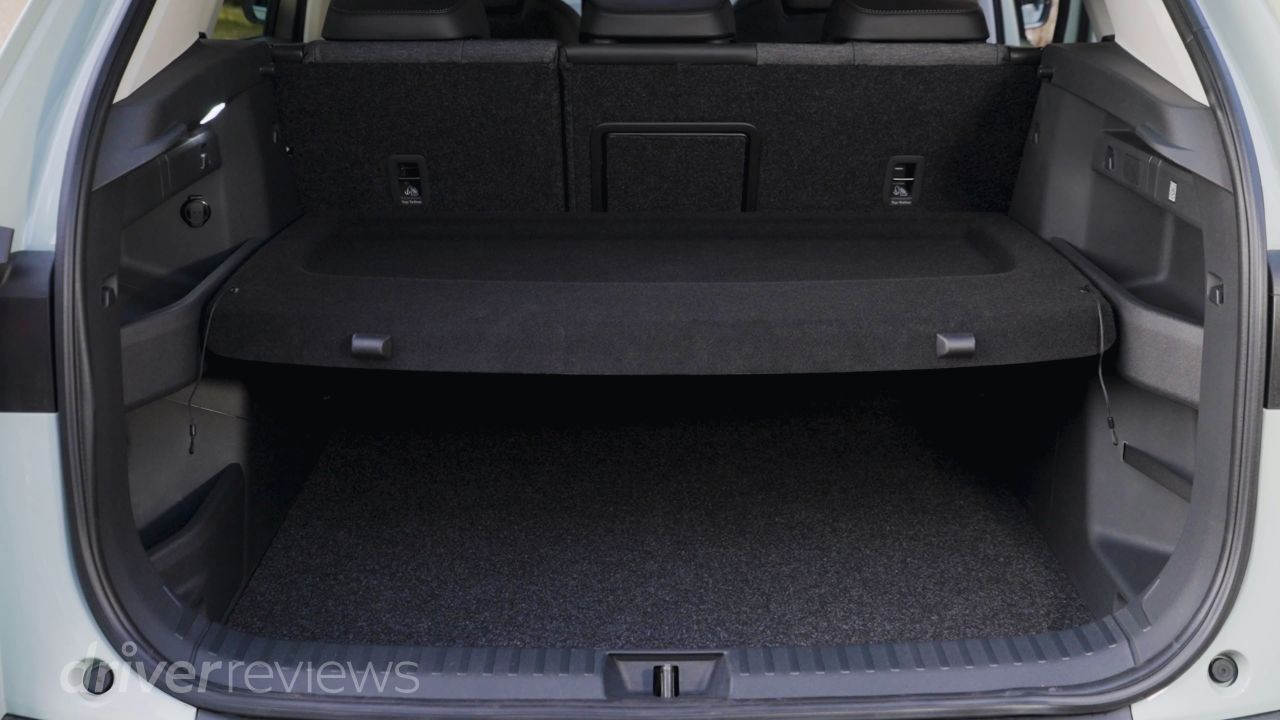 Skoda Elroq boot open showing 470-litre load area with height-adjustable parcel shelf