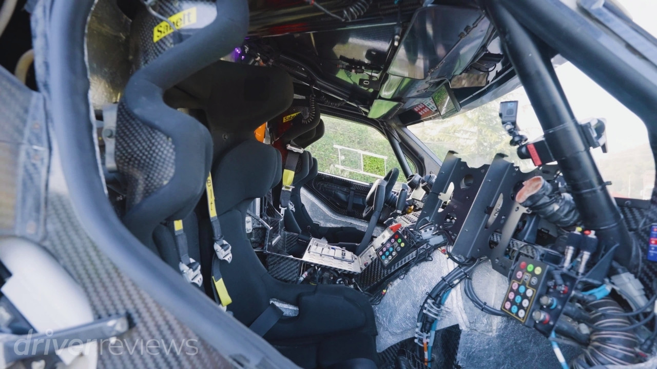 Dacia Sandrider competition cockpit with racing seats, digital displays and rally raid controls