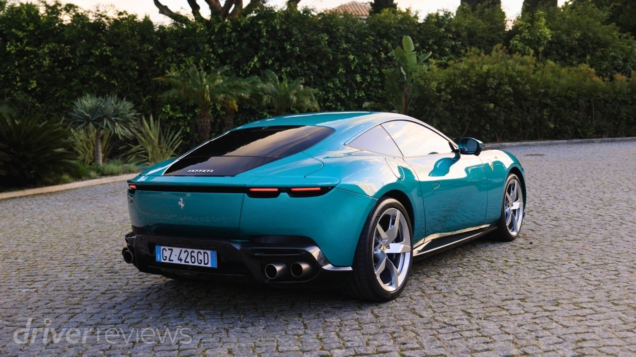 Green Ferrari Amalfi rear three-quarter view on a road in Portugal