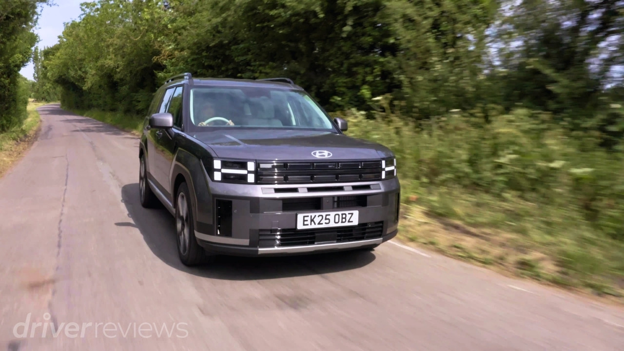 Hyundai Santa Fe Ultimate PHEV driving on a country road