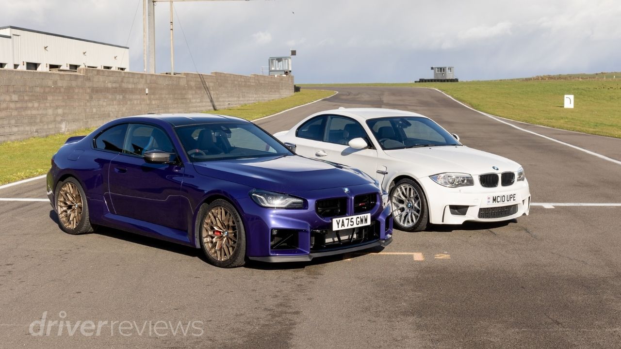 BMW M2 CS in San Marino Blue and BMW 1M in white side by side on circuit during DriverReviews back-to-back tes